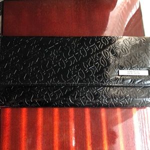 Kenneth Cole black paten trifold wallet